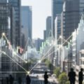 シルチェスター・インターナショナル・インベスターズとは？日本の都市における投資活動を象徴する抽象的なシーンを描写。