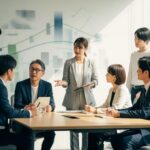 会社員が国民年金と厚生年金を本当に二重払いするのかを考えるオフィスの風景。健康的なビジネス環境を反映。