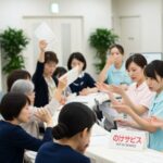 青森県弘前市でマイナ保険証の不具合が発生し、国保加入者の負担割合が確認できない状況を示す医療現場の光景。
